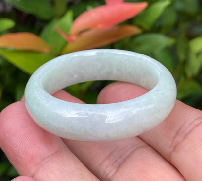 Solid icy light apple green natural Type A Burmese baby jade bangle bracelet in size 36.4mm