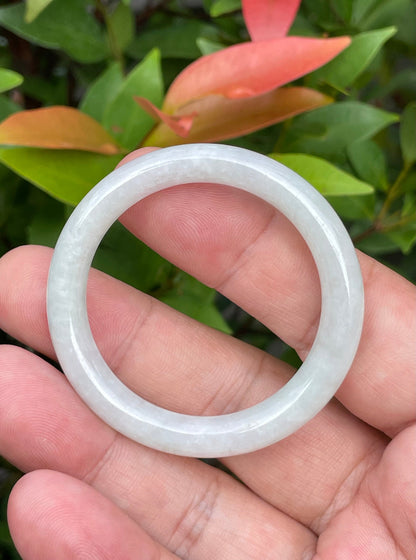 Solid icy white and apple green natural Type A Burmese baby jade bangle bracelet in size 40mm