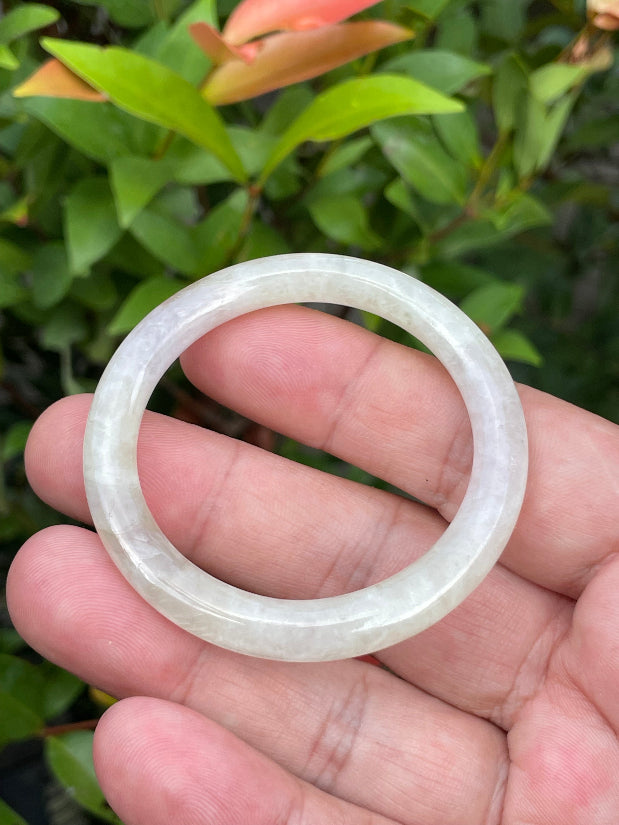 Solid icy light yellow, white, and lavender natural Type A Burmese baby jade bangle bracelet in size 44.5mm