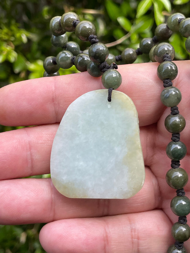 [JP067] Close-up of semi-translucent untreated Type A green jade dragon carving