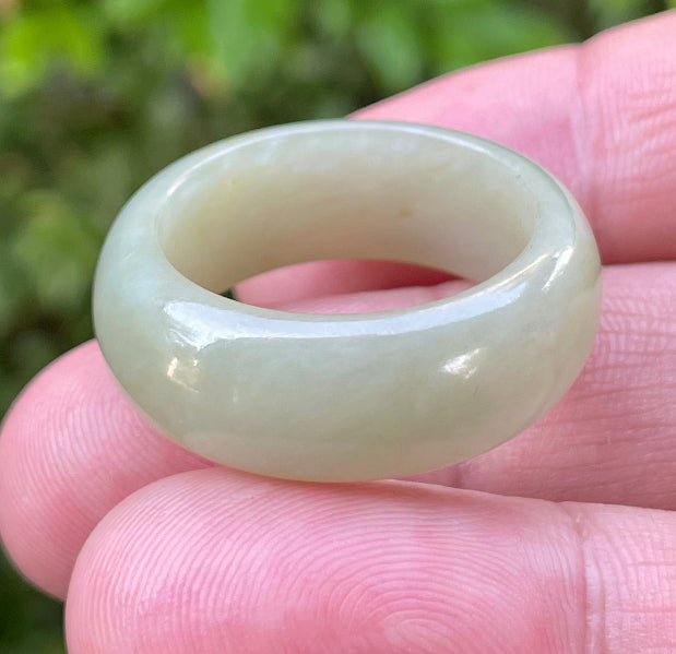 Solid icy apple green and honey natural Type A Burmese jade ring band in size US 12