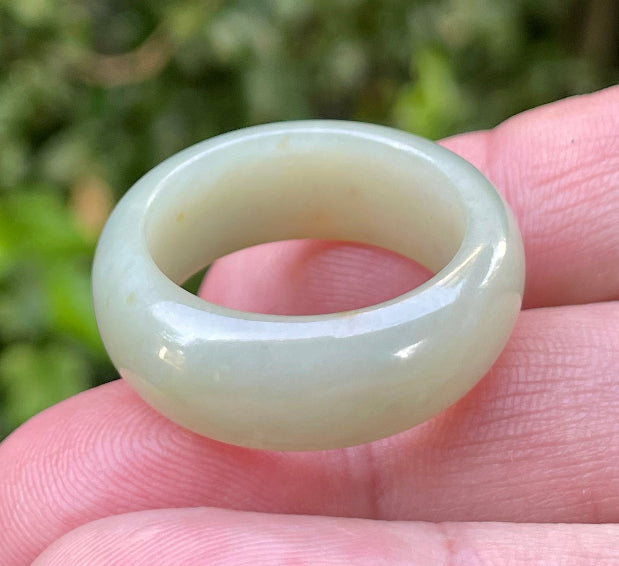 Solid icy apple green and honey natural Type A Burmese jade ring band in size US 12