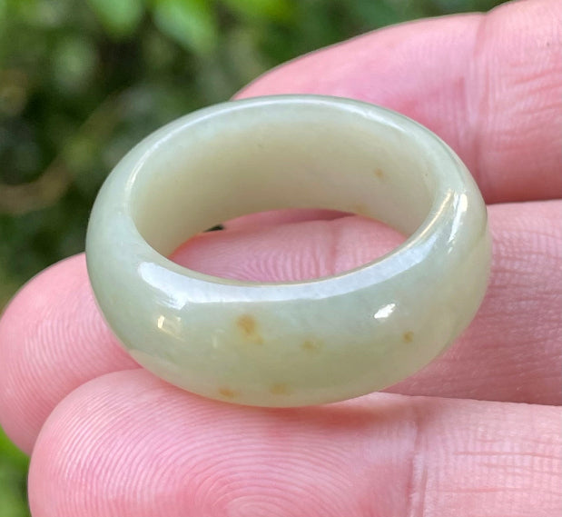 Solid icy apple green and honey natural Type A Burmese jade ring band in size US 12