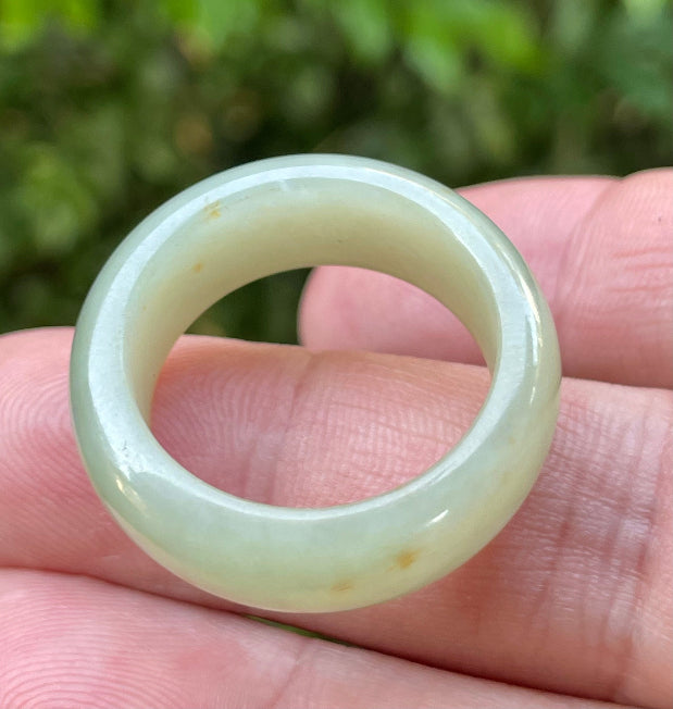 Solid icy apple green and honey natural Type A Burmese jade ring band in size US 12