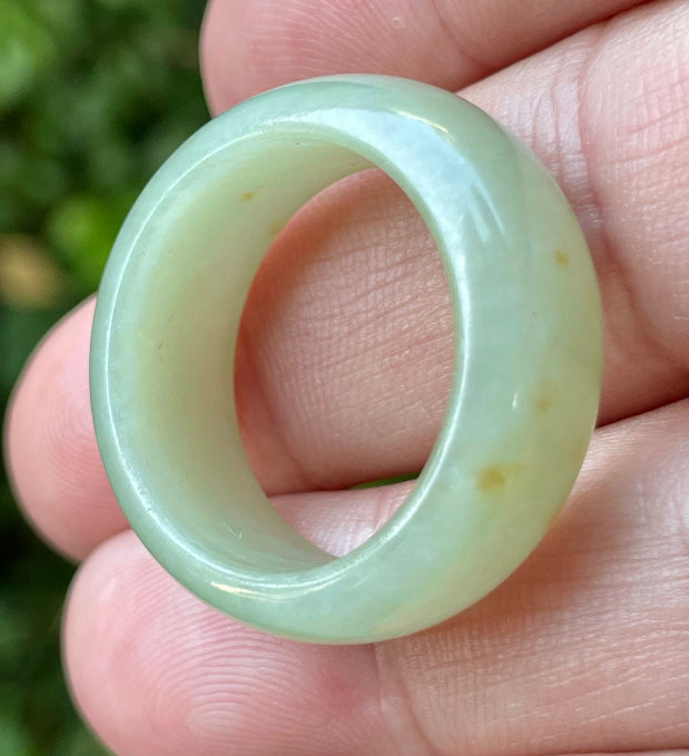 Solid icy apple green and honey natural Type A Burmese jade ring band in size US 12