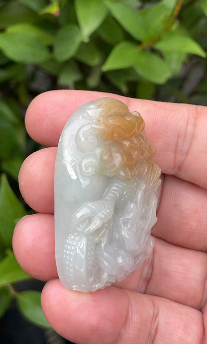 Handcrafted genuine certified Grade A Burmese jadeite amulet representing strength, success, and spiritual authority