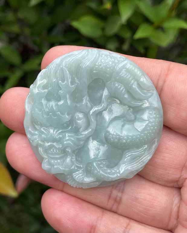 Handcrafted genuine certified Grade A Burmese jadeite amulet representing strength, wisdom, and spiritual clarity