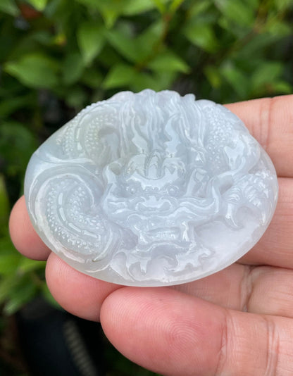 Handcrafted genuine certified Grade A Burmese jadeite amulet representing celestial wisdom and spiritual clarity