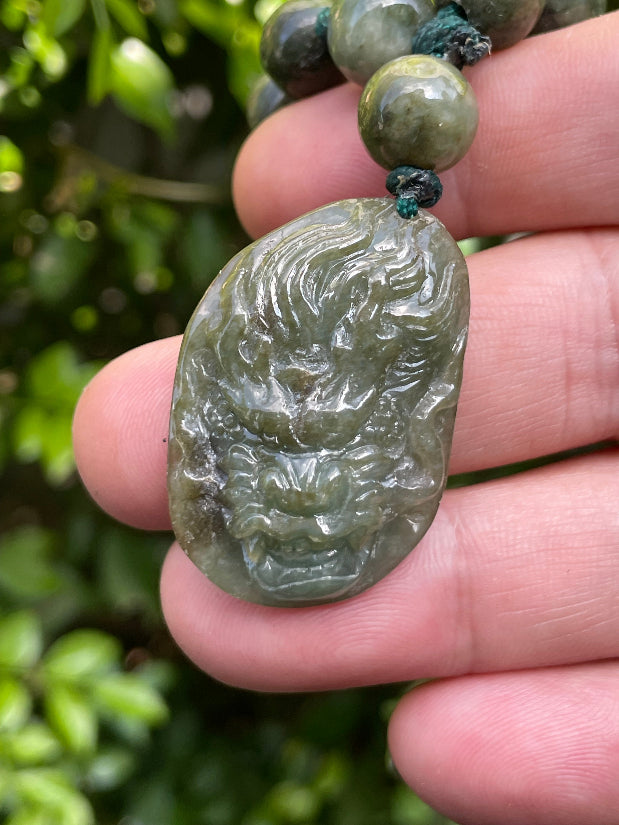Hand-Carved Deep Green Jade Dragon Head Motif with Beaded Necklace