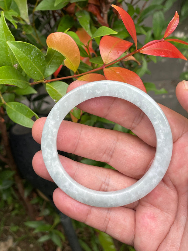 Handcrafted genuine Grade A Burmese jadeite bracelet showcasing a beautiful serene grey and white appearance