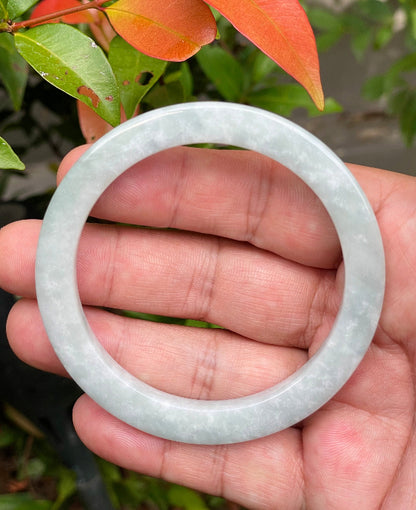 Handcrafted genuine Grade A Burmese jadeite bracelet showcasing a beautiful serene grey and white appearance