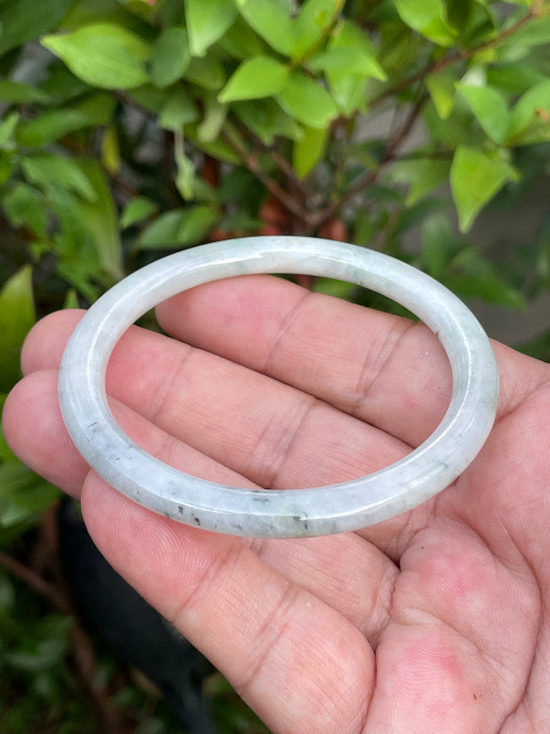 Handcrafted genuine Grade A Burmese jadeite bracelet showcasing a beautiful serene greyish white and green appearance