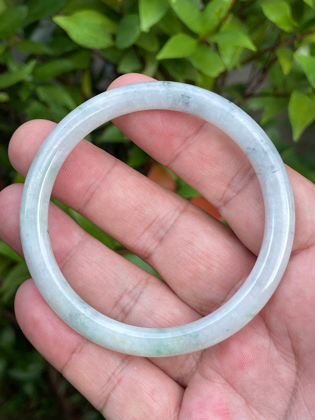 Handcrafted genuine Grade A Burmese jadeite bracelet showcasing a beautiful serene greyish white and green appearance