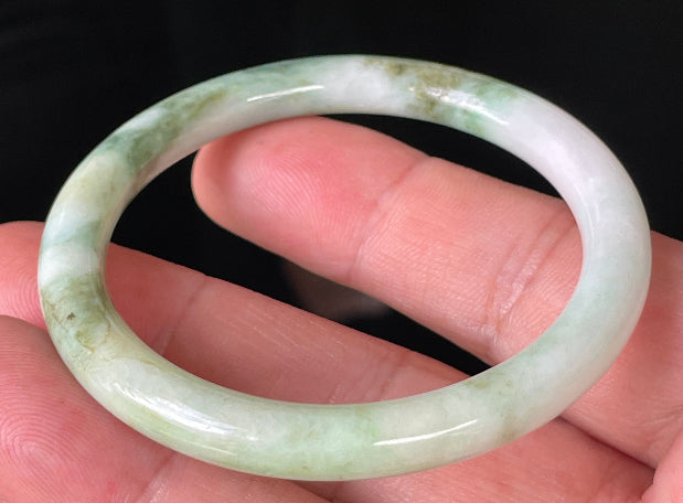 Handcrafted genuine Grade A Burmese jadeite bracelet showcasing a beautiful multi-green and white appearance