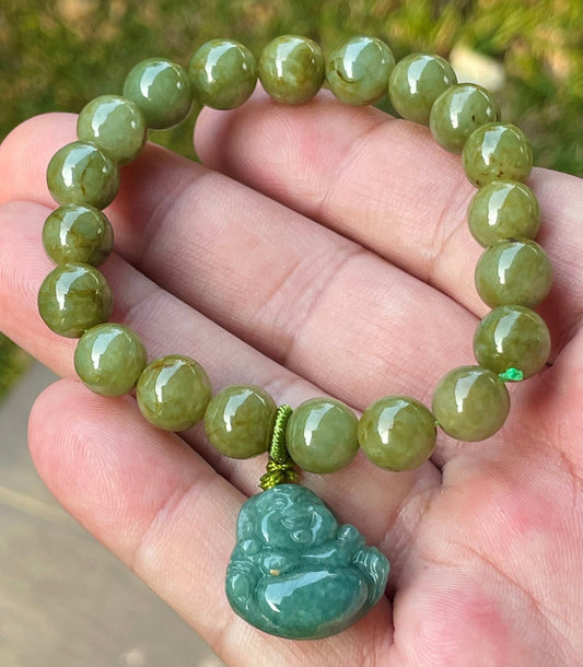 Close-up of a 9mm natural Grade A Burmese jadeite beaded bracelet featuring deep olive green beads and a Laughing Buddha pendant, item JBB179
