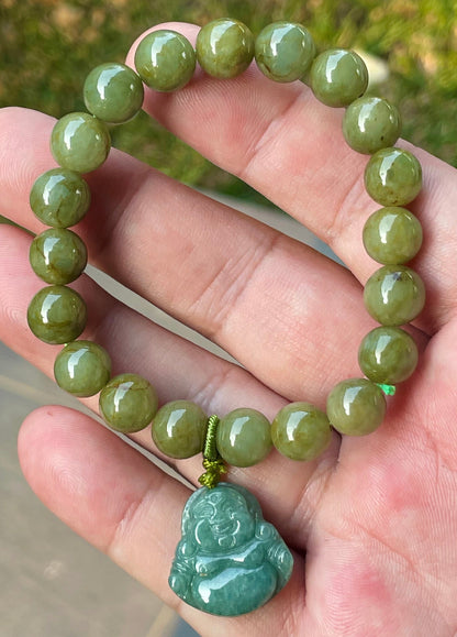 Handcrafted genuine Grade A Burmese jadeite stretch bracelet showcasing beautiful olive green beads with a hand-carved Laughing Buddha pendant