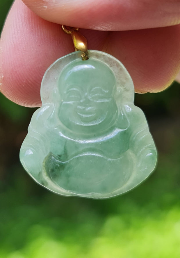 Close-up of a natural Grade A Burmese jadeite pendant in icy imperial green carved as a Happy Buddha, item JHB007