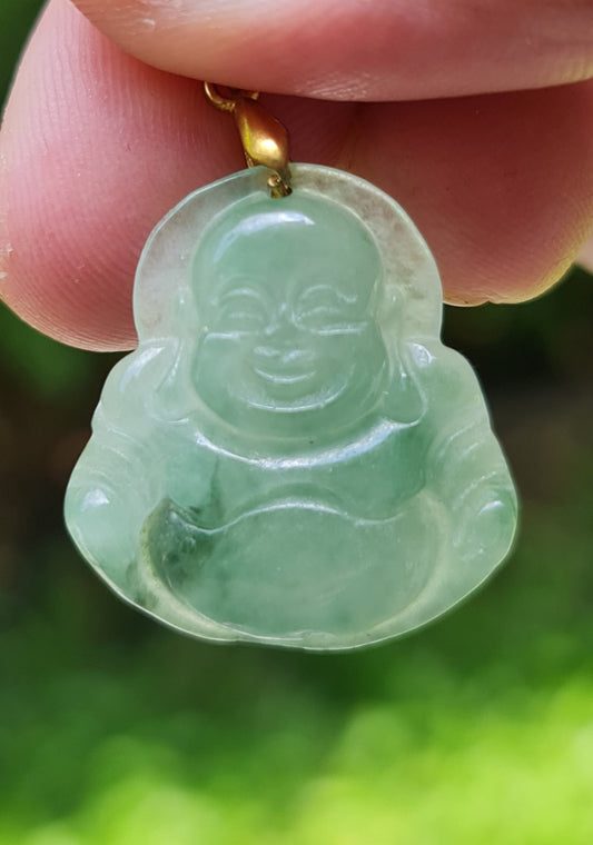 Close-up of a natural Grade A Burmese jadeite pendant in icy imperial green carved as a Happy Buddha, item JHB007