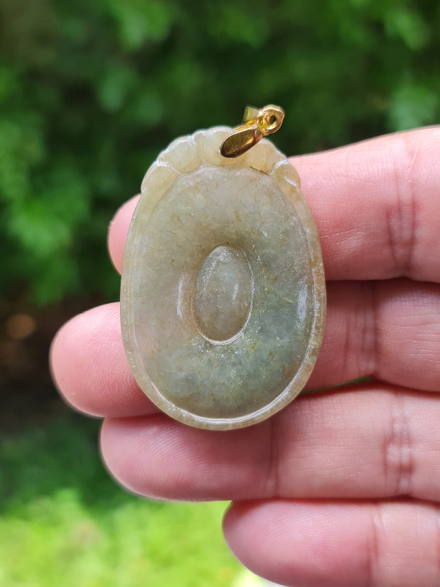Handcrafted genuine Grade A Burmese jadeite amulet representing eternity and spiritual protection