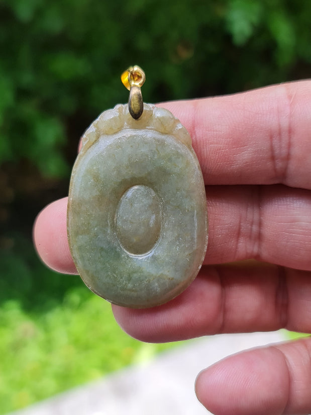 Handcrafted genuine Grade A Burmese jadeite amulet representing eternity and spiritual protection
