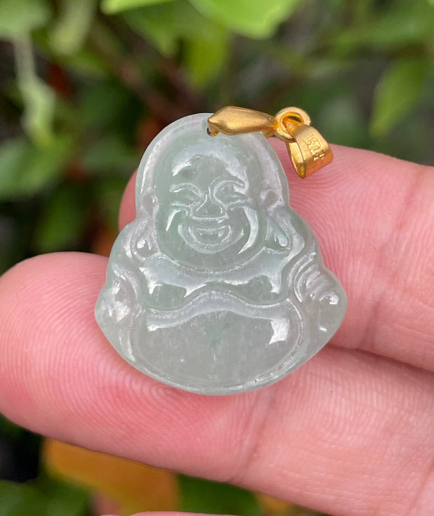Close-up of a natural Grade A Burmese jadeite pendant featuring translucent icy imperial green tones hand-carved in a Happy Buddha motif, item JHB002