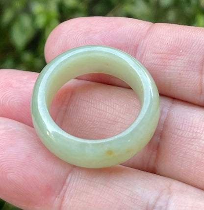Hand-carved genuine Grade A Burmese jadeite round ring blending icy apple green and delicate honey tones