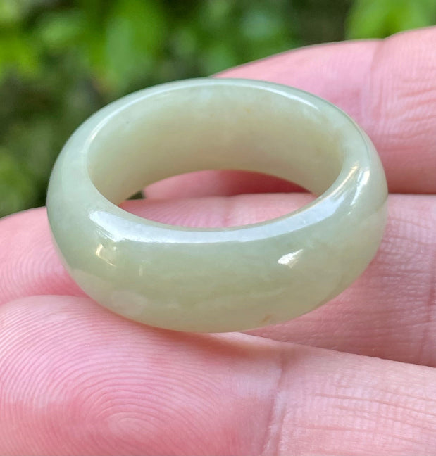 Hand-carved genuine Grade A Burmese jadeite round ring blending icy apple green and delicate honey tones