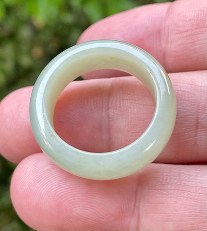 Hand-carved genuine Grade A Burmese jadeite round ring blending icy apple green and delicate honey tones
