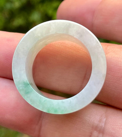 Hand-carved genuine Grade A Burmese jadeite wide band showcasing striking translucency and imperial green swirls
