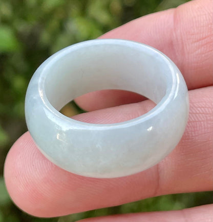 Hand-carved genuine Grade A Burmese jadeite rounded ring showcasing a serene icy milky white translucency