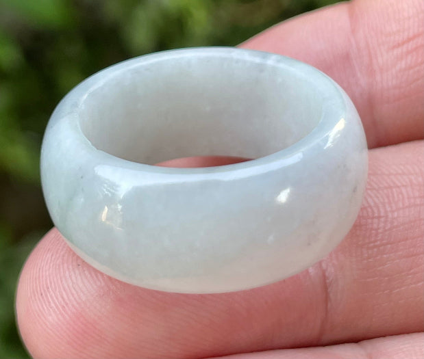 Hand-carved genuine Grade A Burmese jadeite rounded ring showcasing a serene icy milky white translucency