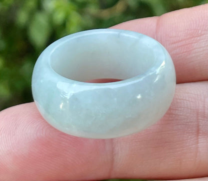 Hand-carved genuine Grade A Burmese jadeite rounded ring showcasing a serene icy milky white translucency