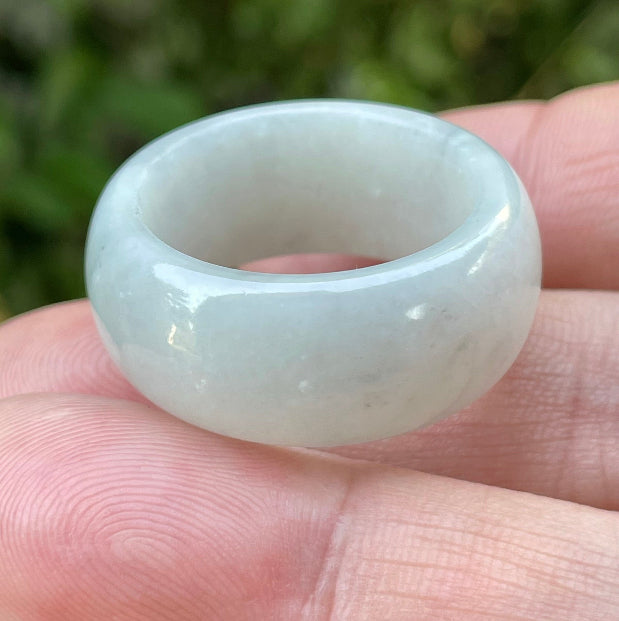 Hand-carved genuine Grade A Burmese jadeite rounded ring showcasing a serene icy milky white translucency