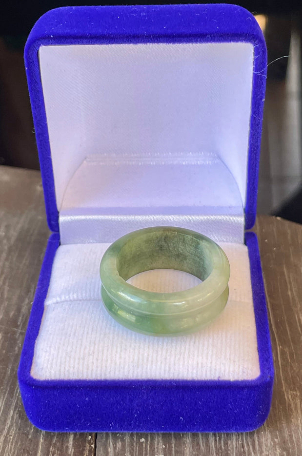 Close-up of a double bangle-style natural Grade A Burmese jadeite ring featuring icy imperial and apple green hues, item JRT009