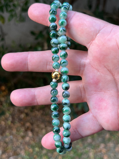 Soft glassy luster and fine crystalline texture of the 6.8mm authentic Myanmar jadeite bead necklace JN087