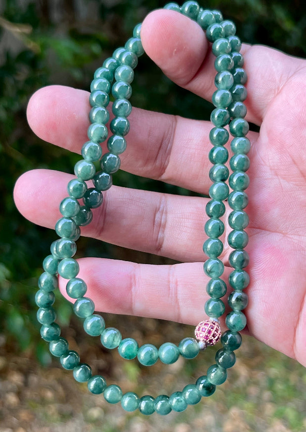 Soft glassy luster and fine crystalline texture of the 6.2mm authentic Myanmar jadeite bead necklace JN074