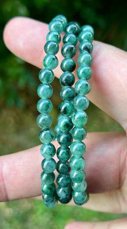 Soft glassy luster and fine crystalline texture of the 5.9mm authentic Myanmar jadeite bead necklace JN076