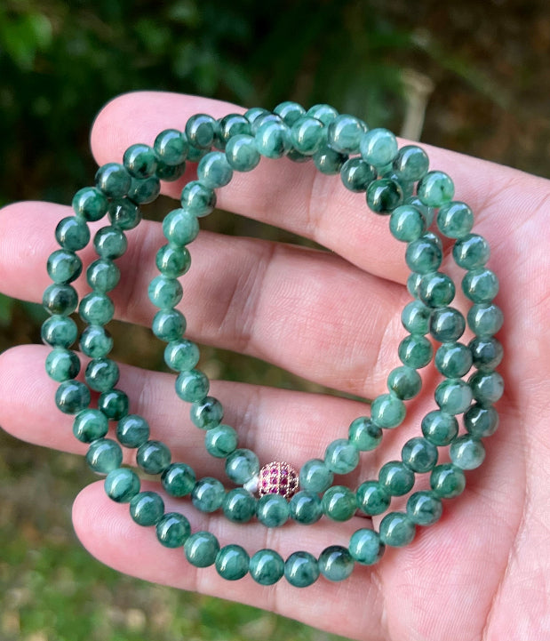 Soft glassy luster and fine crystalline texture of the 5.9mm authentic Myanmar jadeite bead necklace JN076