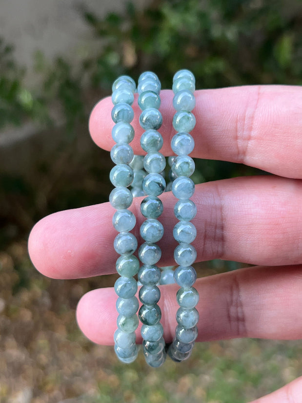 Soft glassy luster and fine crystalline texture of the 5.9mm authentic Myanmar jadeite bead necklace JN078