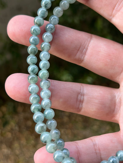 Soft glassy luster and fine crystalline texture of the 5.9mm authentic Myanmar jadeite bead necklace JN078