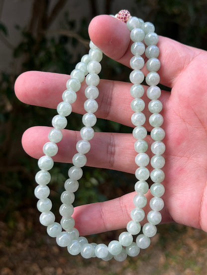 Soft glassy luster and fine crystalline texture of the 7.3mm authentic Myanmar jadeite bead necklace JN082