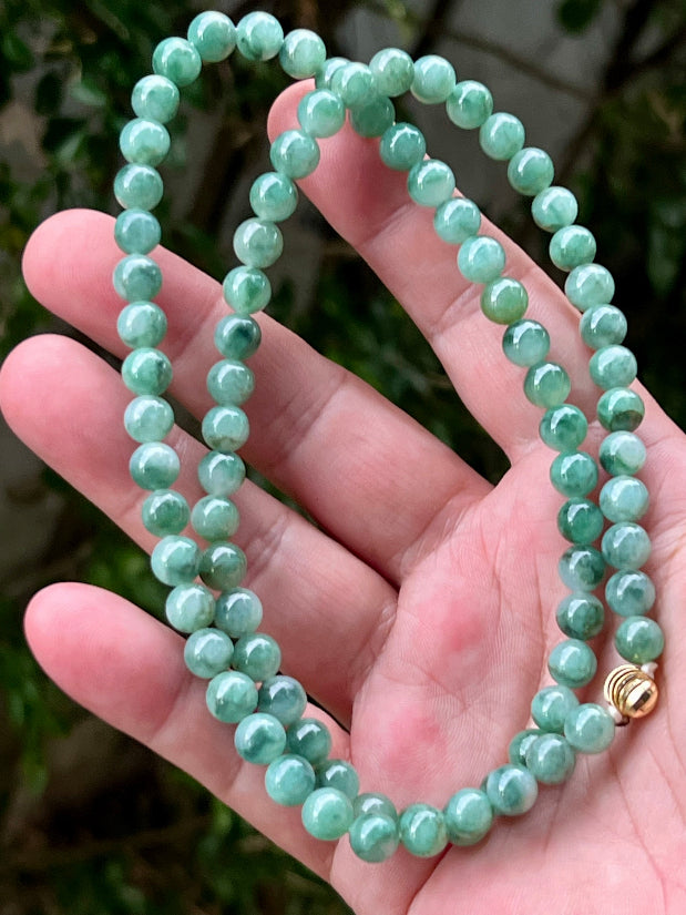 Soft glassy luster and fine crystalline texture of the 7.5mm authentic Myanmar jadeite bead necklace JN004