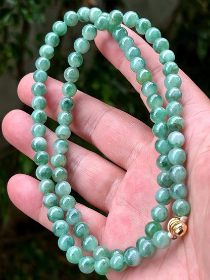 Soft glassy luster and fine crystalline texture of the 7.5mm authentic Myanmar jadeite bead necklace JN004