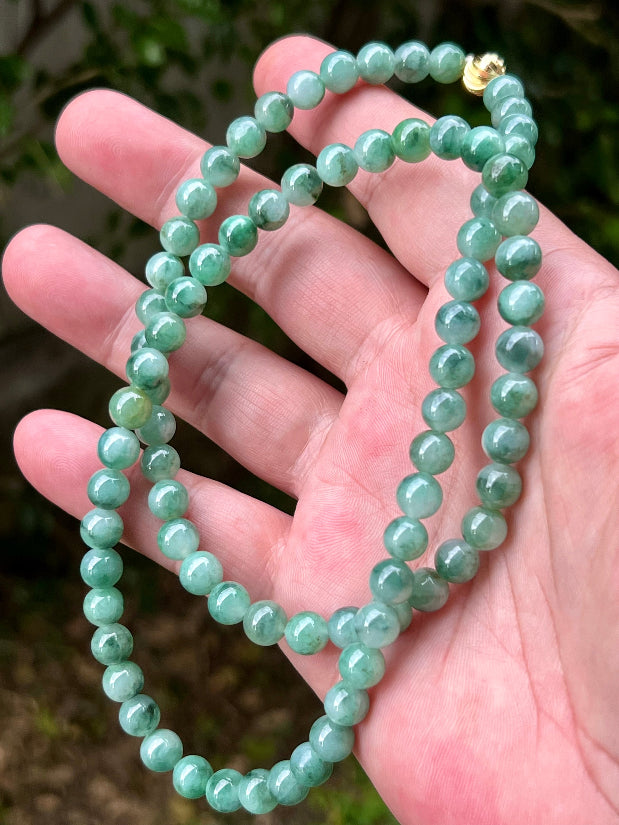 Soft glassy luster and fine crystalline texture of the 7.5mm authentic Myanmar jadeite bead necklace JN004
