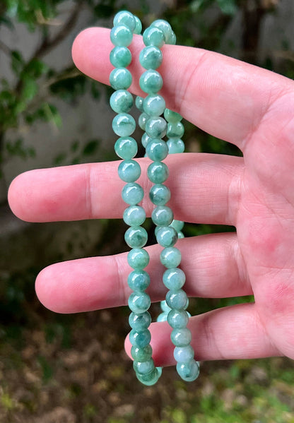 Soft glassy luster and fine crystalline texture of the 7.5mm authentic Myanmar jadeite bead necklace JN004