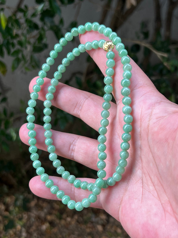 Soft glassy luster and fine crystalline texture of the 6mm authentic Myanmar jadeite bead necklace JN084