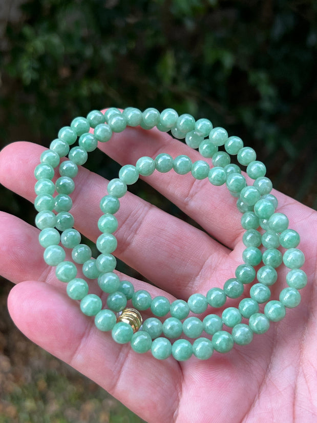 Soft glassy luster and fine crystalline texture of the 6mm authentic Myanmar jadeite bead necklace JN084