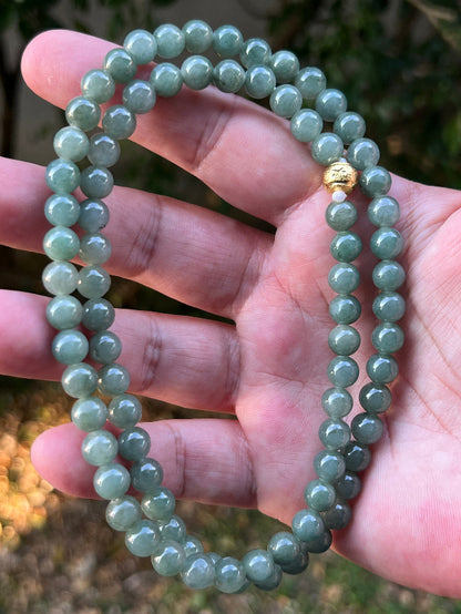 Soft glassy luster and fine crystalline texture of the 7.3mm authentic Myanmar jadeite bead necklace JN089