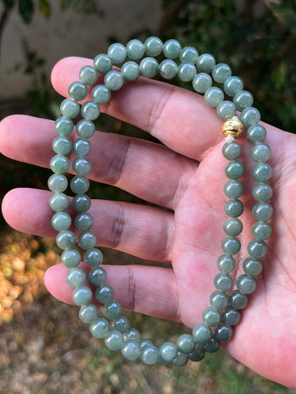 Soft glassy luster and fine crystalline texture of the 7.3mm authentic Myanmar jadeite bead necklace JN089
