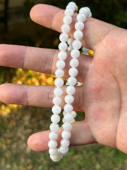 Soft glassy luster and fine crystalline texture of the 7.2mm authentic Myanmar jadeite bead necklace JN090